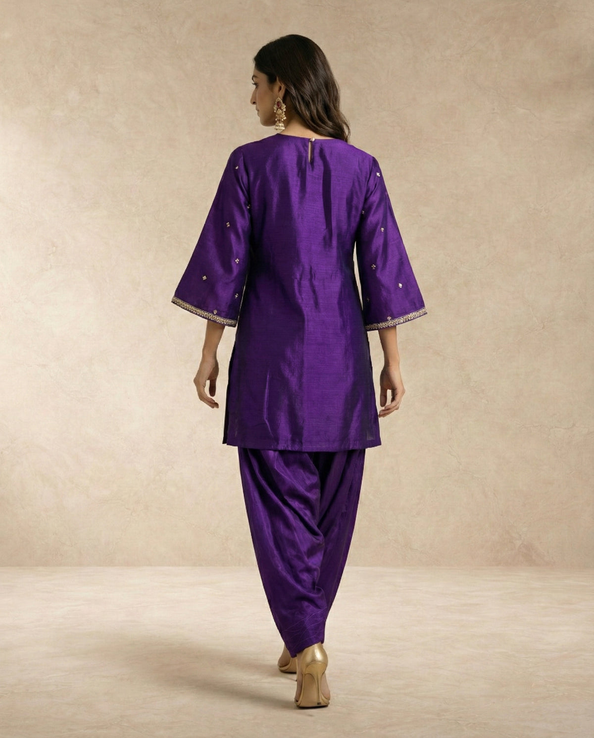 BANAFSHA purple silk kurta with gold sprig butis and draped salwar by Neha Sharma Label.