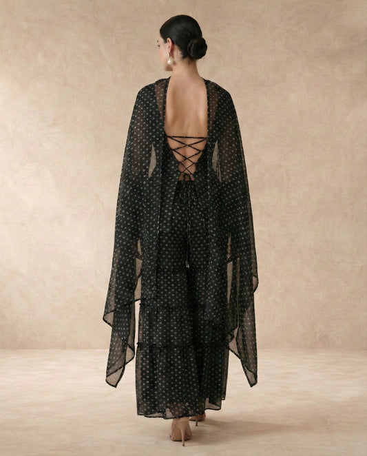 Back view of RUKSAR black sharara set with criss-cross lace-up doori back and dupatta.