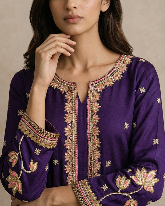 NAZME purple silk kurta with gold and rose embroidered placket by Neha Sharma Label.