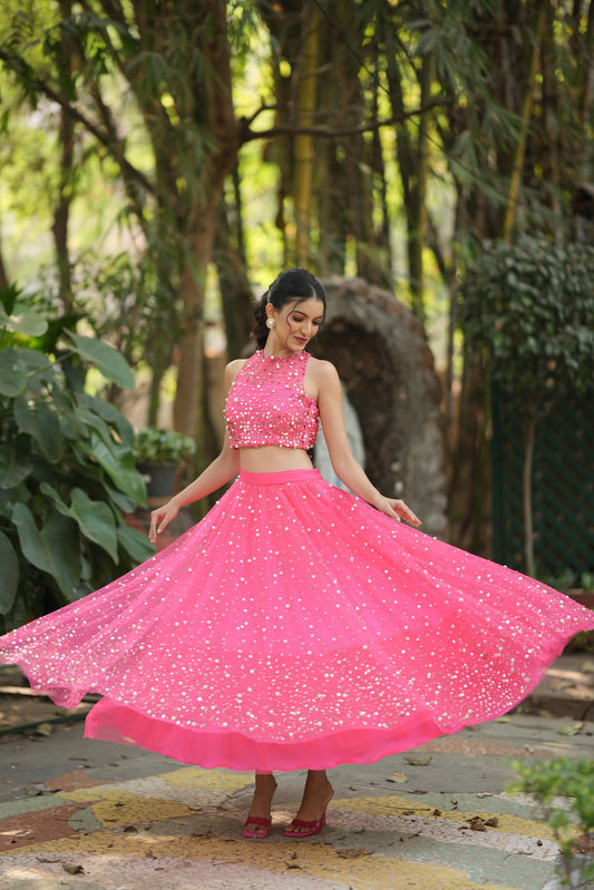 Pink party wear lehenga choli with crop top and Bandhani print