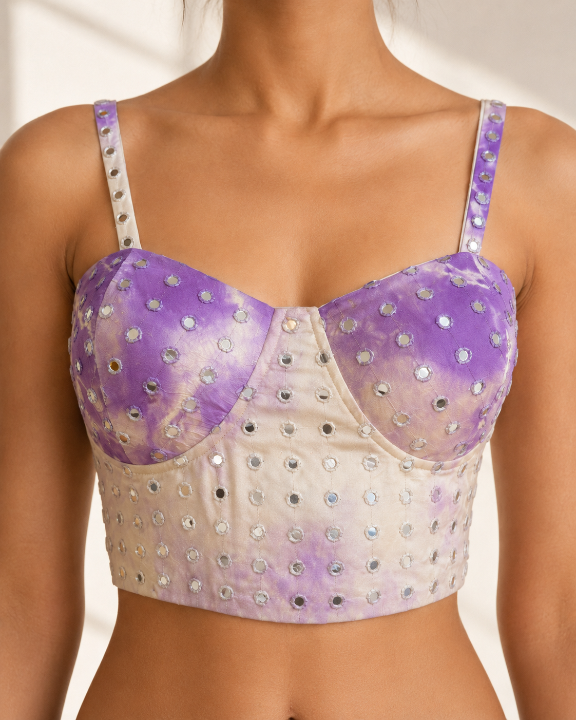 Close view of the mirror embellishment and sweetheart cups on the FALSA lilac blouse.