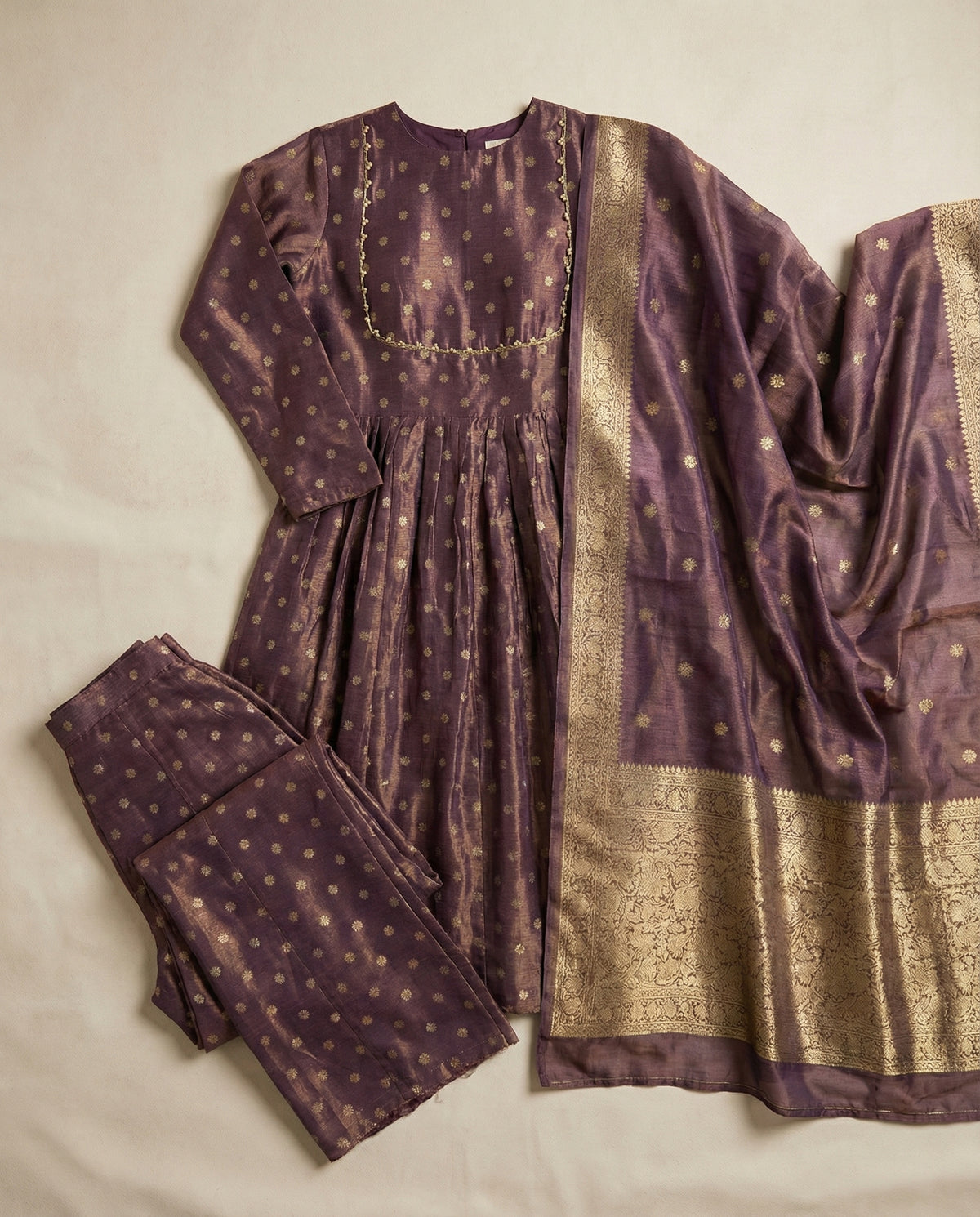 ANAYA mauve banarasi silk three-piece anarkali set with dupatta by Neha Sharma Label.