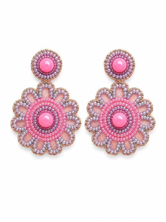 Pair of Cranberry Pop pink and lilac bead flower drop earrings with gold-tone edging by Neha Sharma Label.