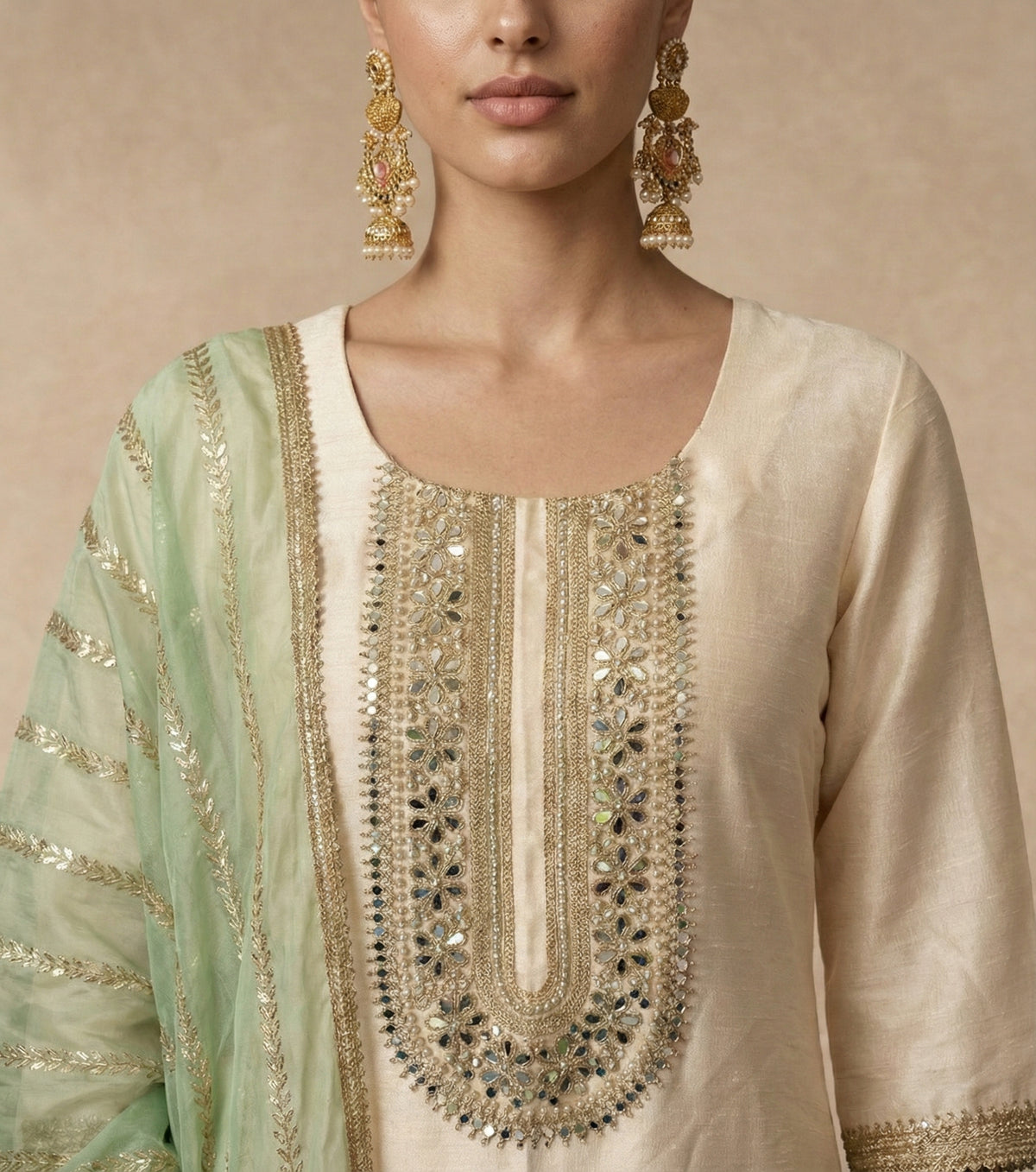 AFREEN mint tissue dupatta with gold leaf-vine stripes and lace border by Neha Sharma Label.