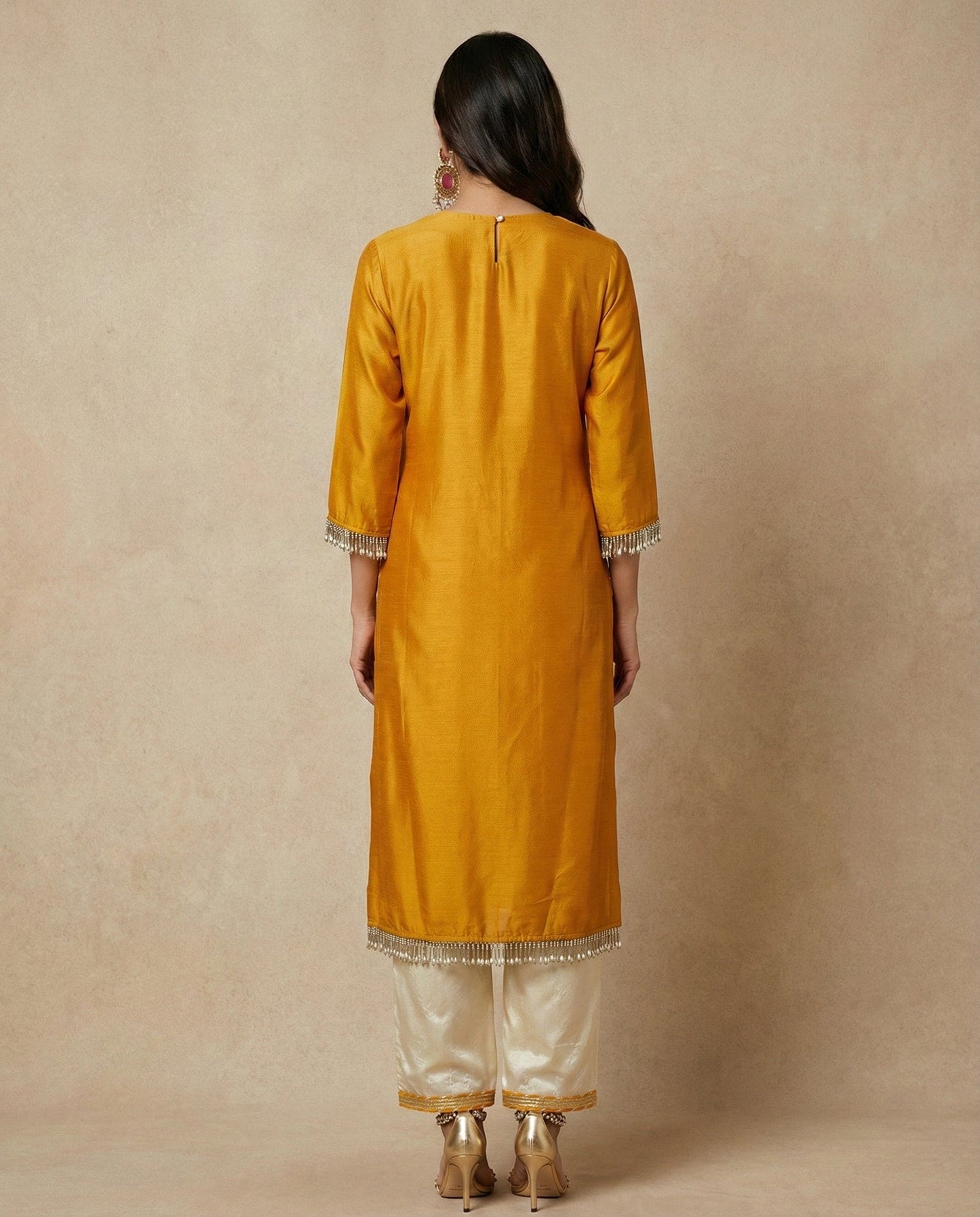 Full back view of the HINA kurta set with cream parallel pants by Neha Sharma Label.