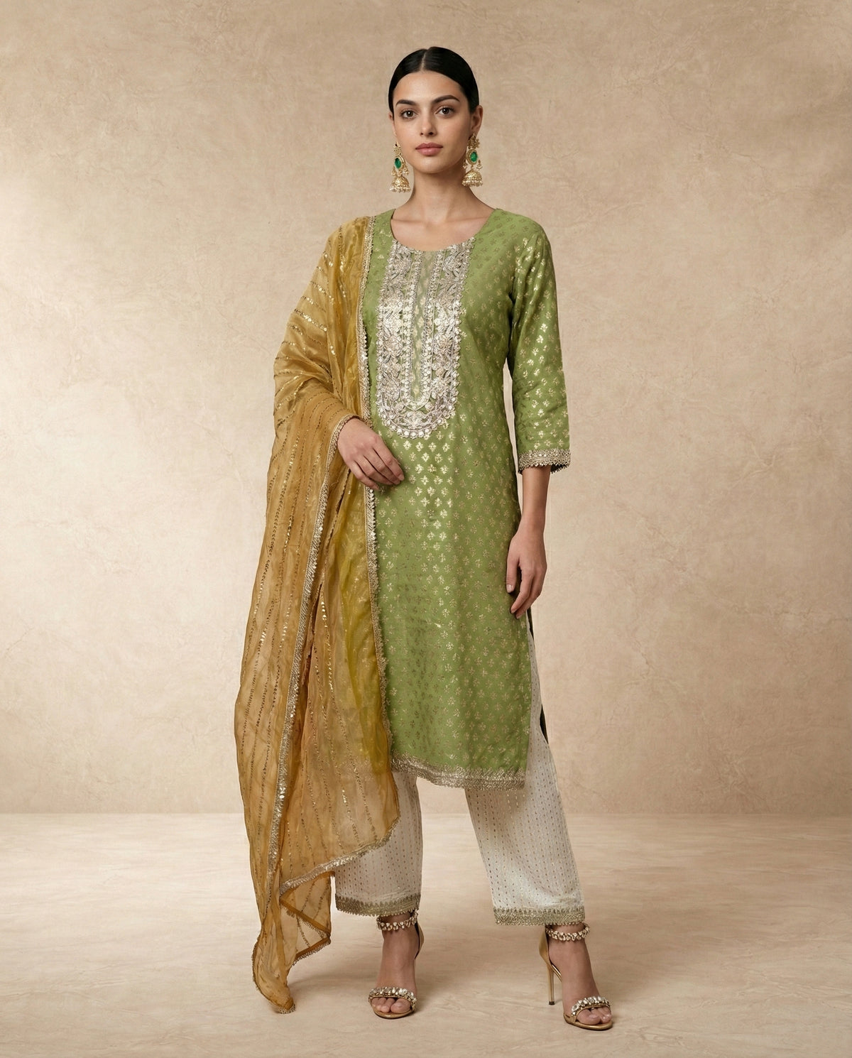 Neha Sharma Label ZUBAIDA olive green banarasi silk kurta set with gold tissue dupatta.