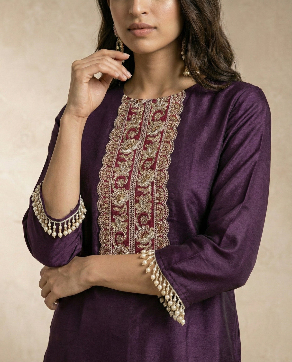 SABA plum kurta set with flowing ivory silk farshi salwar by Neha Sharma Label.