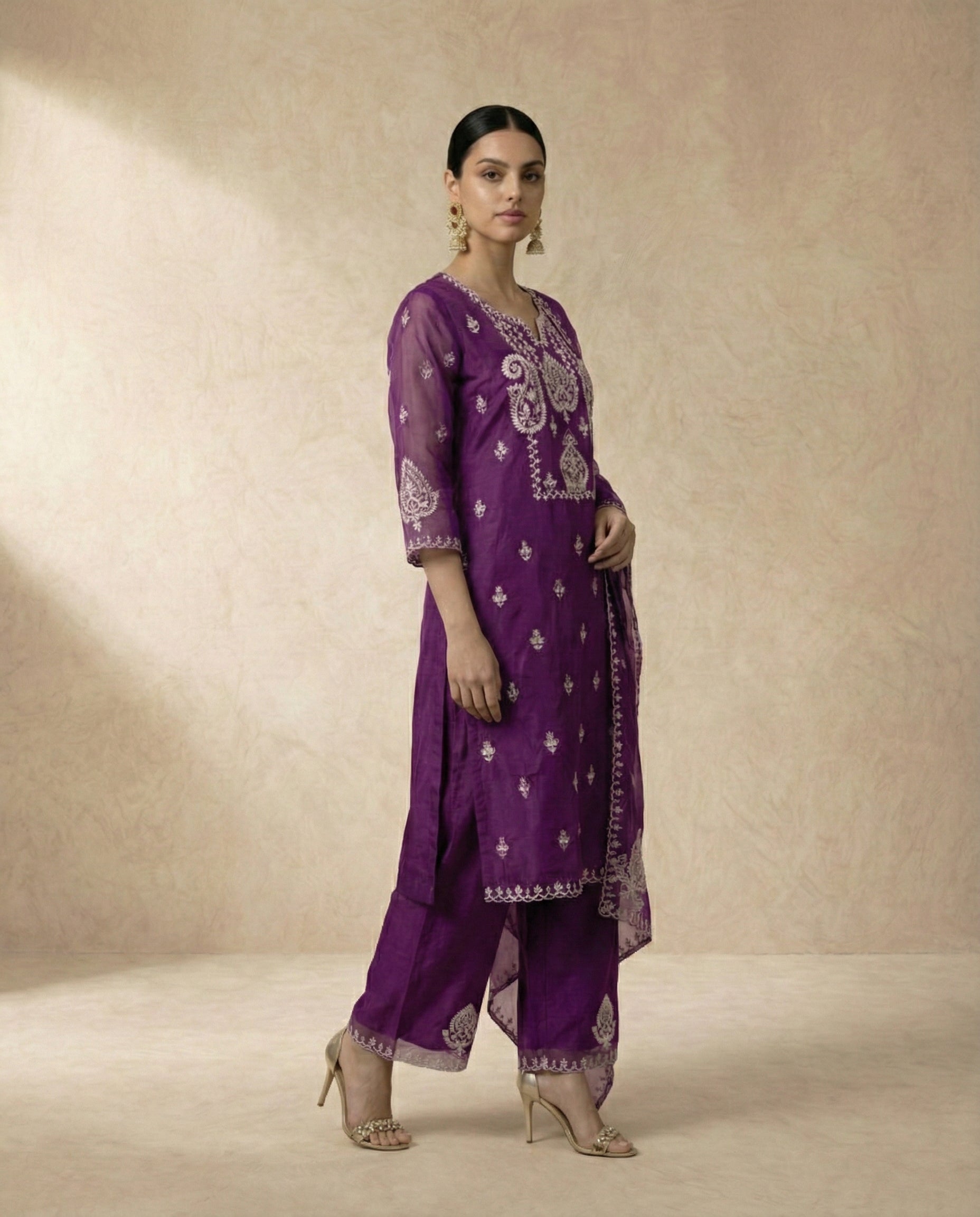 Neha Sharma Label AFSHEEN purple organza kurta set with ivory embroidery and scalloped dupatta.