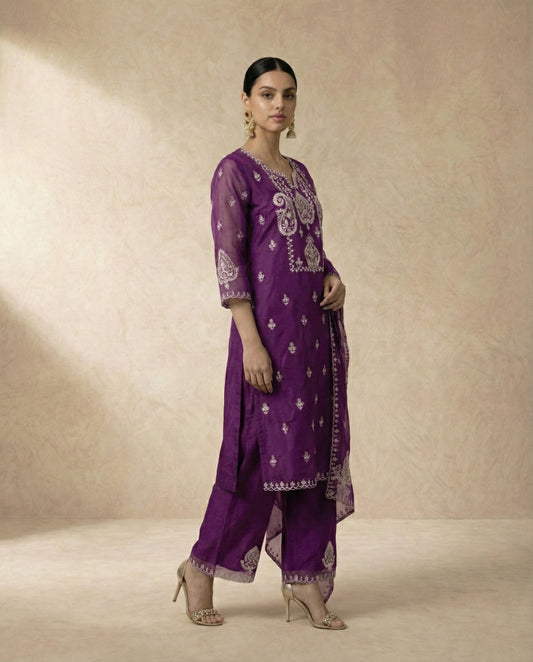Neha Sharma Label AFSHEEN purple organza kurta set with ivory embroidery and scalloped dupatta.
