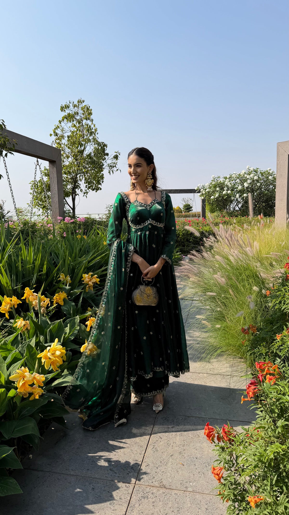 YASMIN bottle green anarkali with gold embroidered sweetheart neckline by Neha Sharma Label.