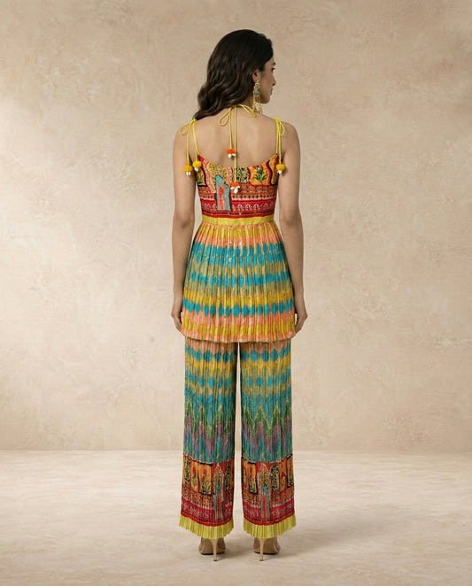 Back view of the SAFI flap kurta set showing the tie-up shoulders and pom pom trims.