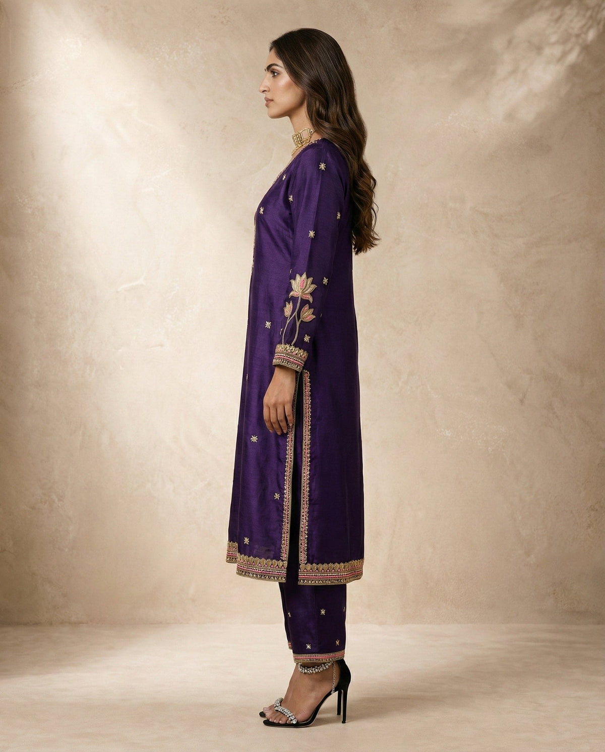 NAZME purple silk kurta set with lotus sleeve embroidery and bordered hems by Neha Sharma Label.