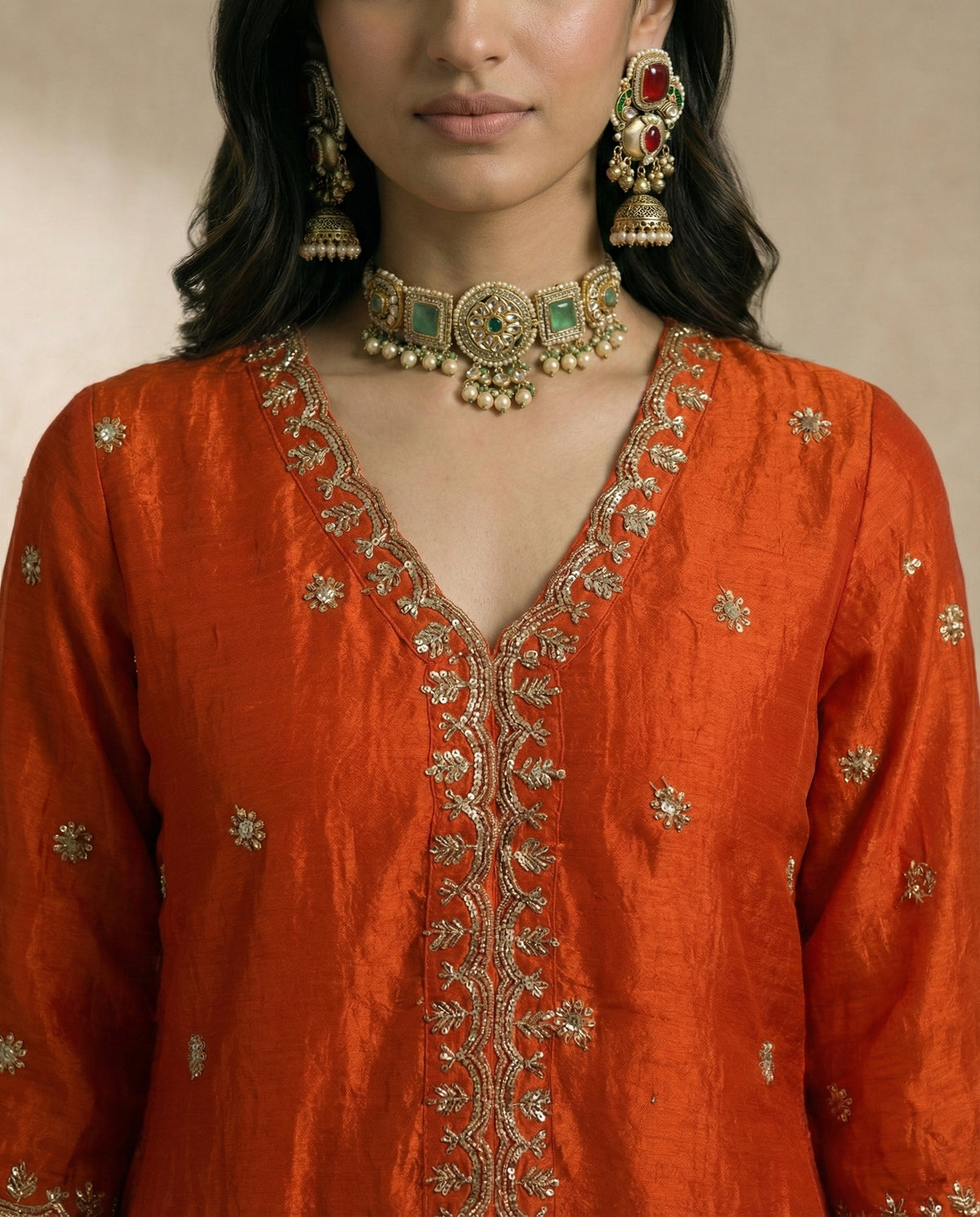 SAMARA vermilion kurta with scalloped embroidered placket and flowing sharara by Neha Sharma Label.