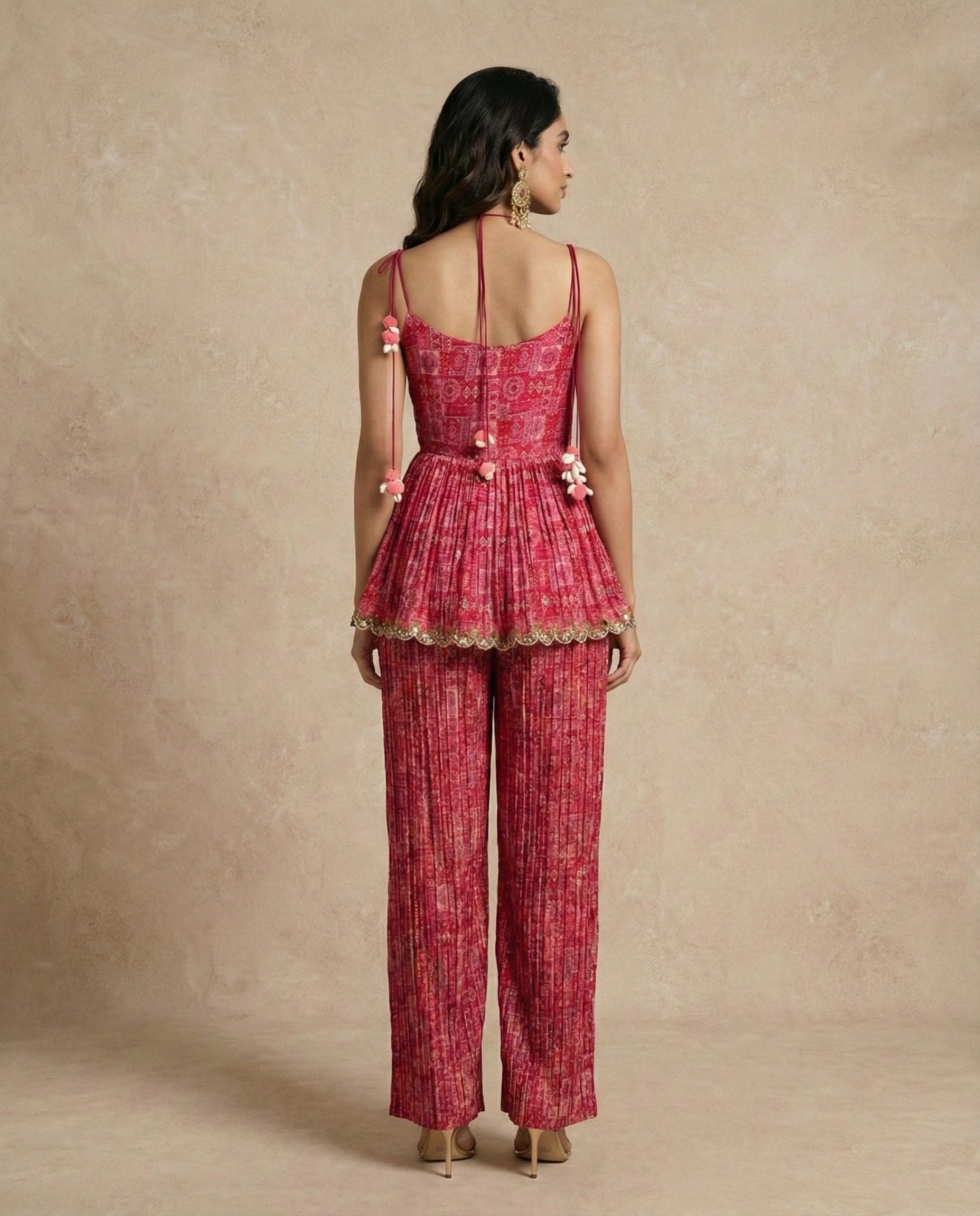 FALAK rosewood printed peplum set with scalloped gold hem border by Neha Sharma Label.