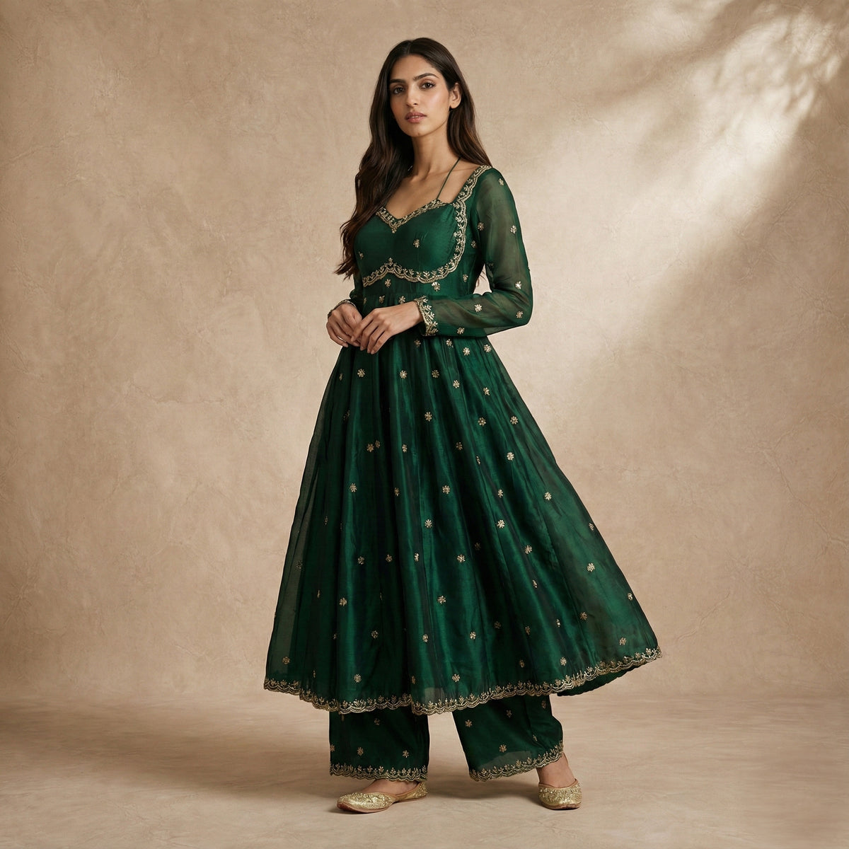 Neha Sharma Label YASMIN bottle green silk organza anarkali set with scalloped gold borders.