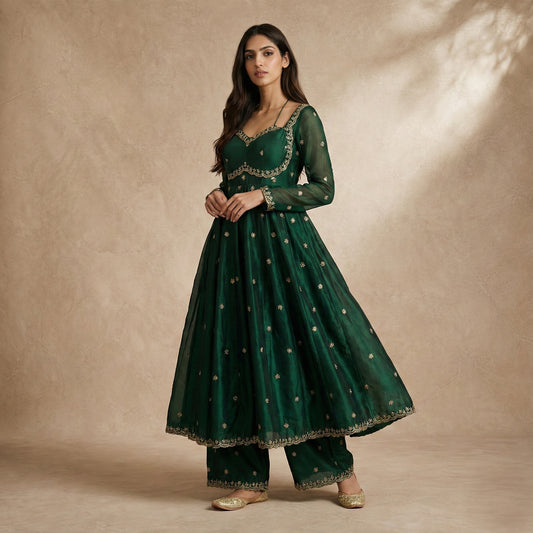 Neha Sharma Label YASMIN bottle green silk organza anarkali set with scalloped gold borders.