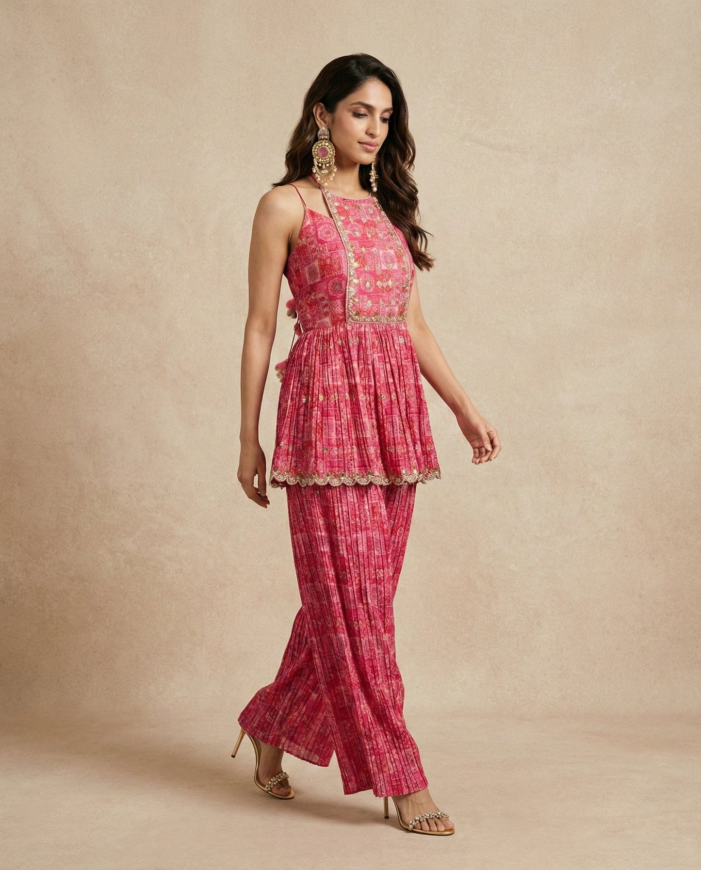 Neha Sharma Label FALAK rosewood printed crushed silk peplum kurta set with wide-leg pants.