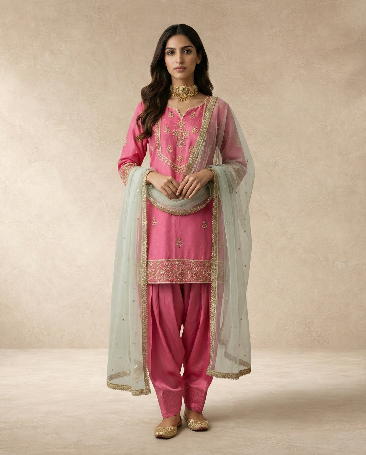 Neha Sharma Label HANIYA pink silk kurta set with hand-embroidered yoke and mint net dupatta.