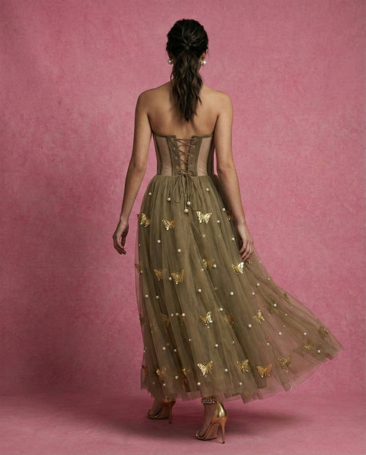 SOREN olive tulle gown, front view — strapless sweetheart corset bodice with sheer boned waist