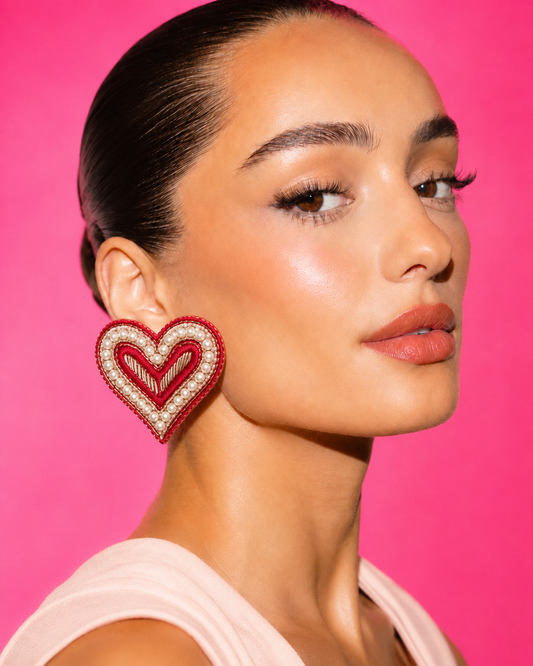Neha Sharma Label Bonbon Amour embroidered red heart stud earrings with mirror teardrops.