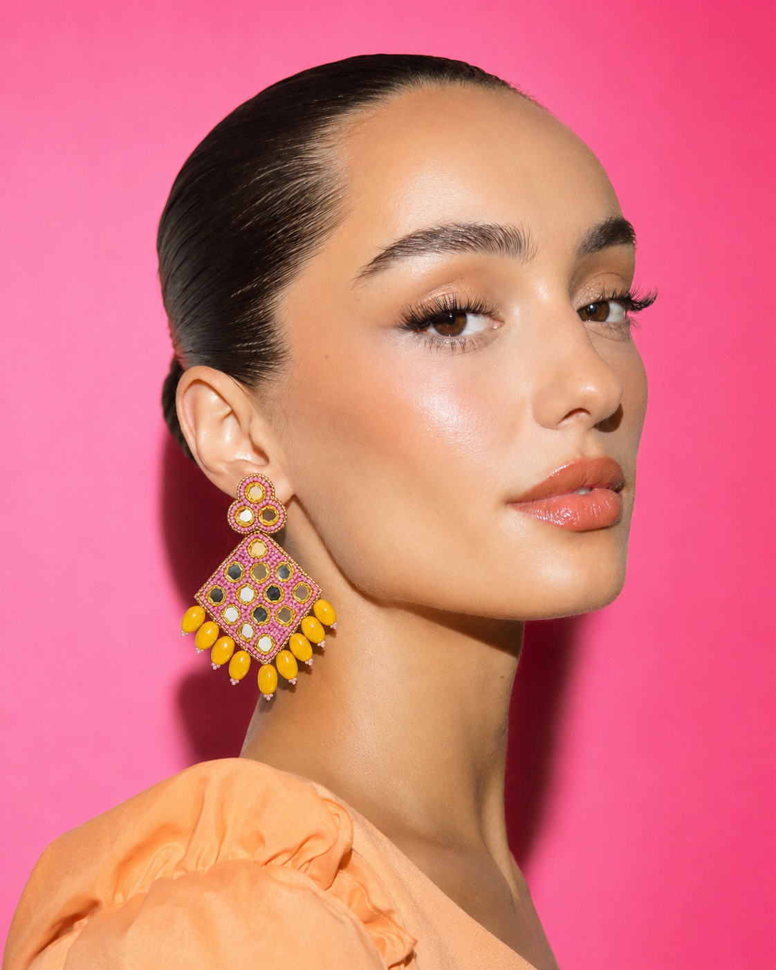 Neha Sharma Label Pineapple Pie rose beaded earrings with round mirrors and yellow bead drops.