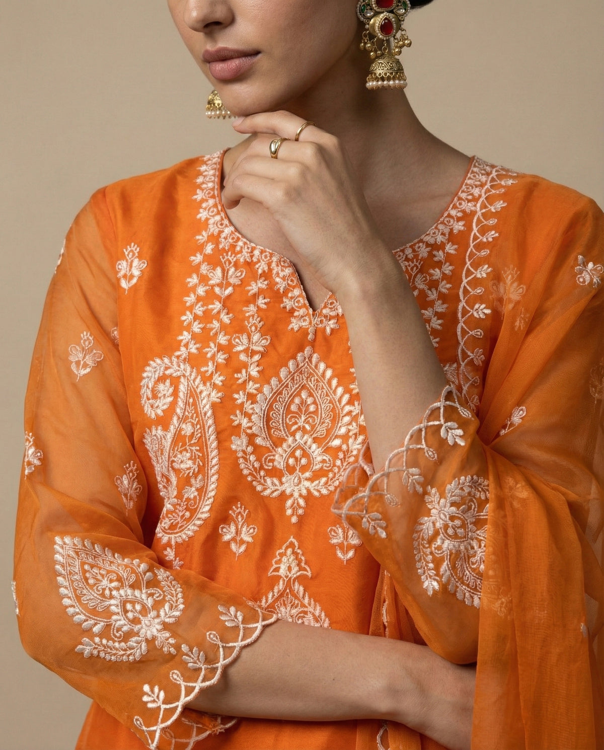 IFRA orange organza kurta with scalloped embroidered dupatta by Neha Sharma Label.