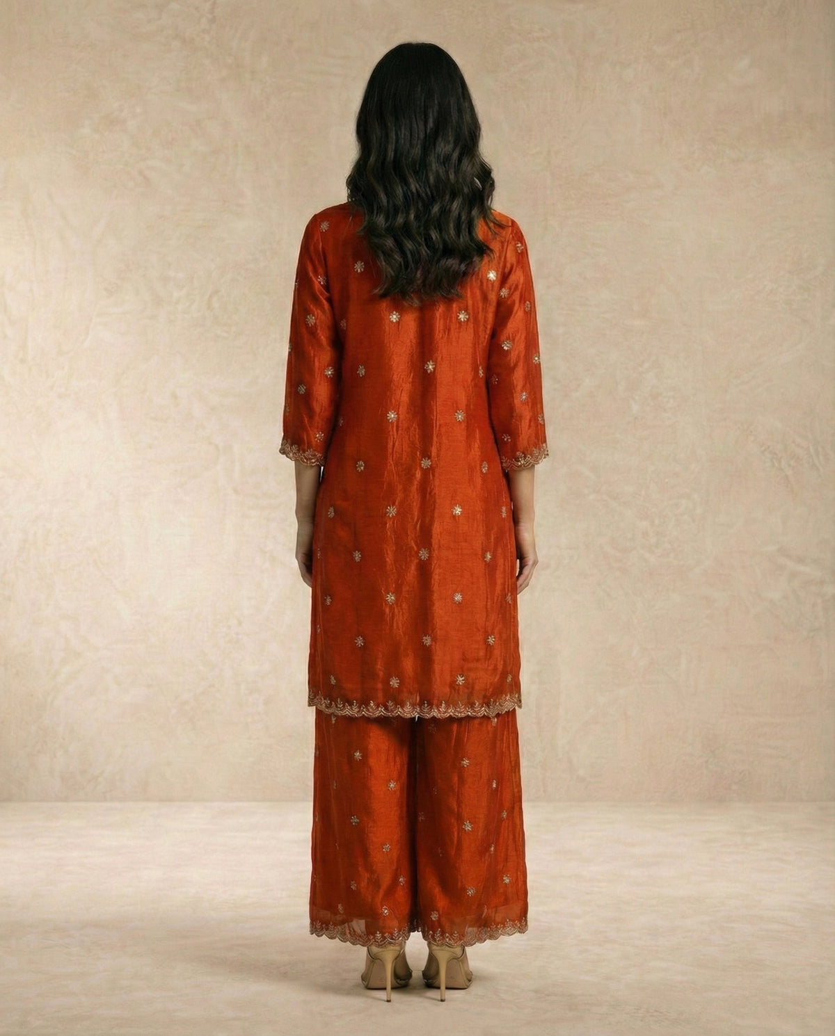 SAMARA vermilion short kurta and wide sharara with scalloped hems by Neha Sharma Label.