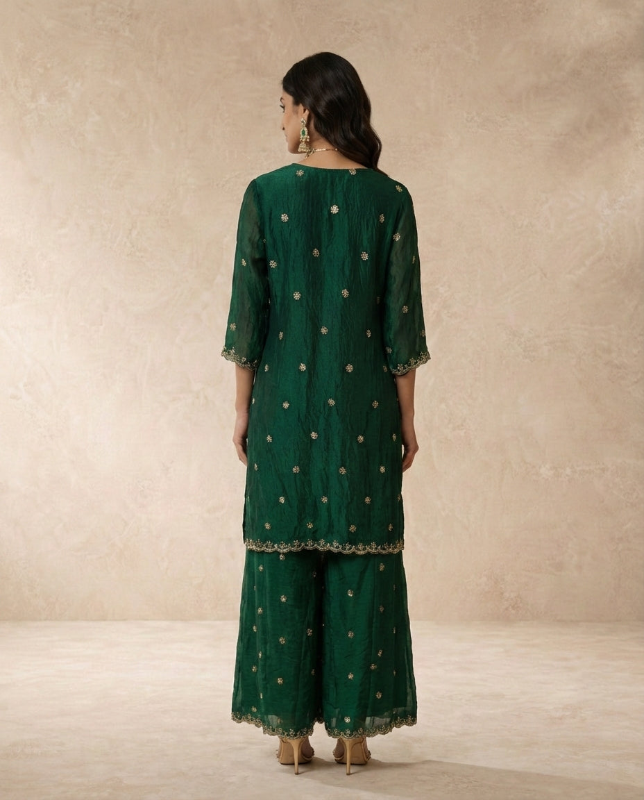 Ferdos emerald sharara set with scallop-bordered V-neck and centre-front embroidered band.