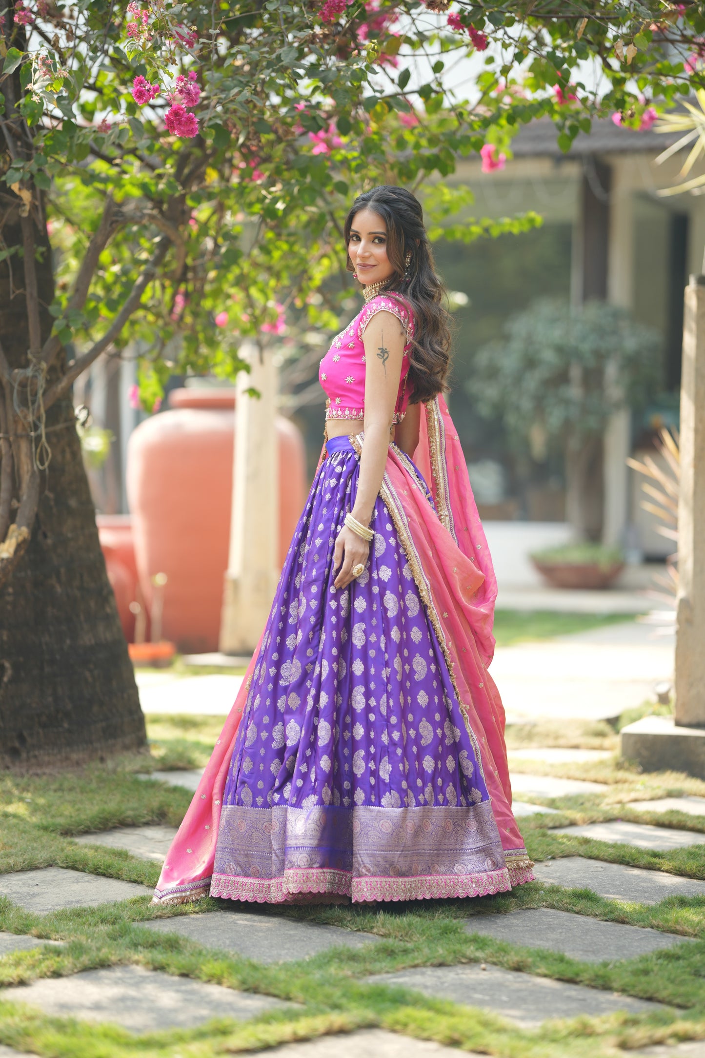 Side view of bridal Banarasi lehenga choli showing blouse and flared skirt details