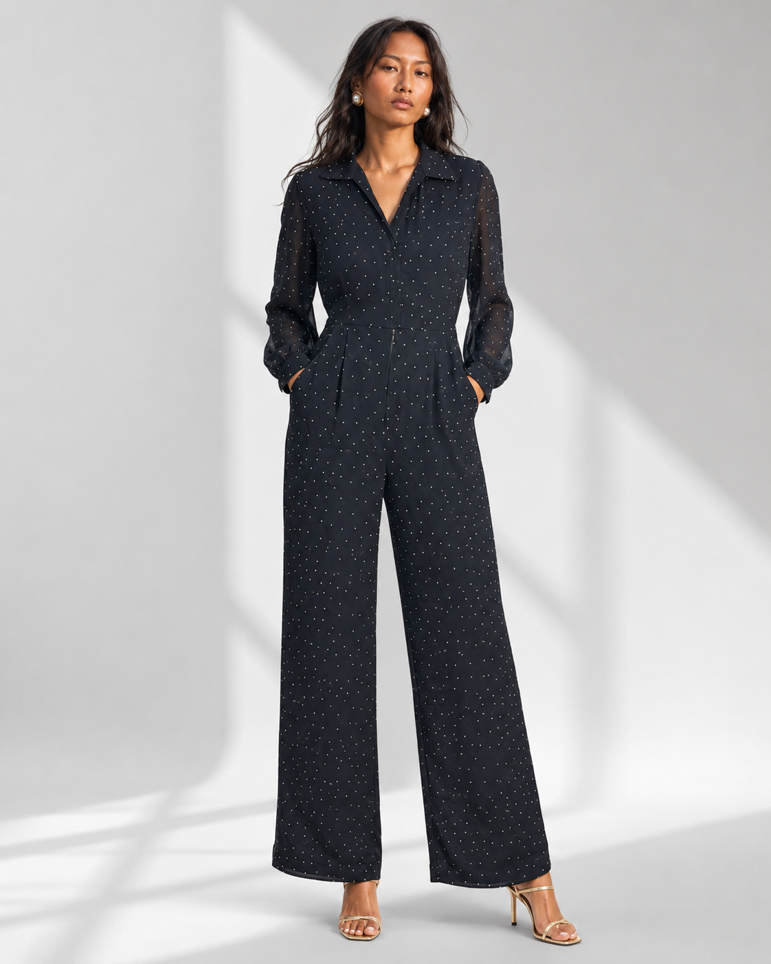 Neha Sharma Label SEVERINE navy micro dot wide-leg jumpsuit with collar, front view on model.