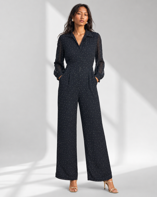 Neha Sharma Label SEVERINE navy micro dot wide-leg jumpsuit with collar, front view on model.