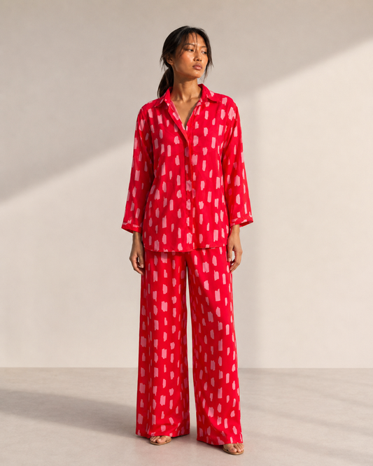 Model wearing SCARLETT red brushstroke print co-ord set by Neha Sharma Label.
