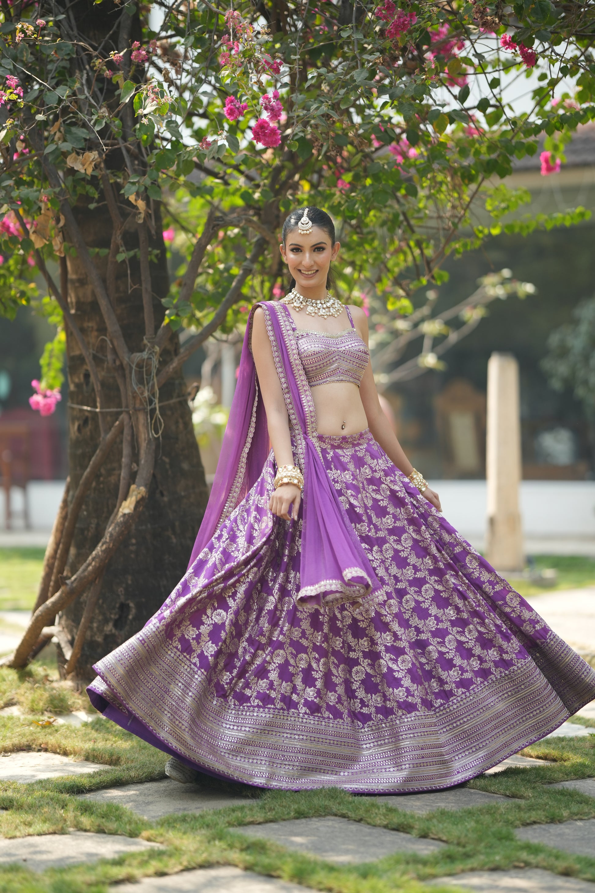 Lavender bridal lehenga with zari work ? front view showing full flair and embroidery details.
