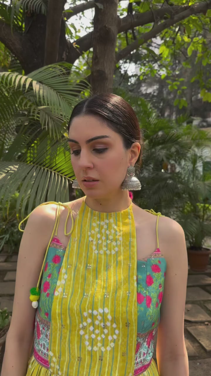 Festive yellow Anarkali kurta set for weddings and cultural events.