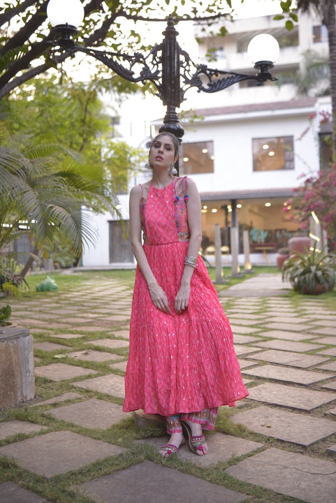 ISABEL pink bandhani print tiered anarkali set with Mughal floral bodice panels.