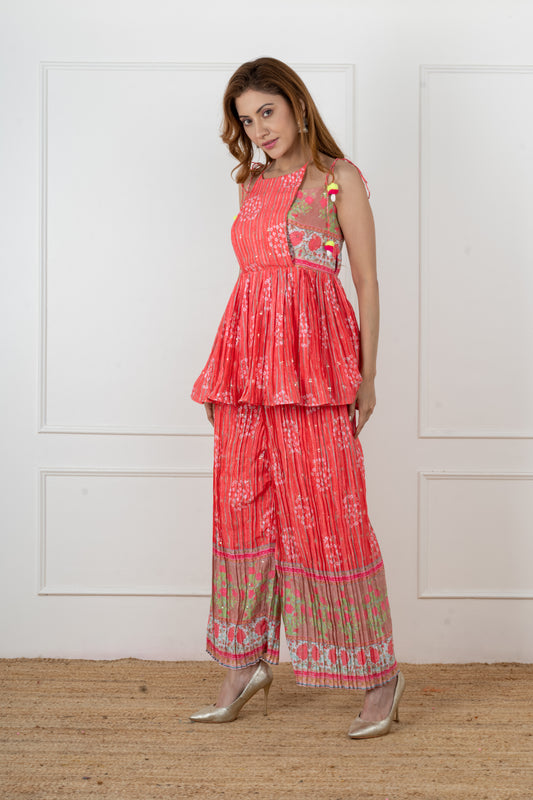 RAYA flap kurta and flared sharara in bandhani and stripe print with floral hem border.